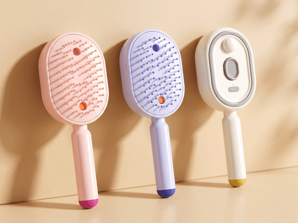 Multi-function massage mist comb in pink, purple and white